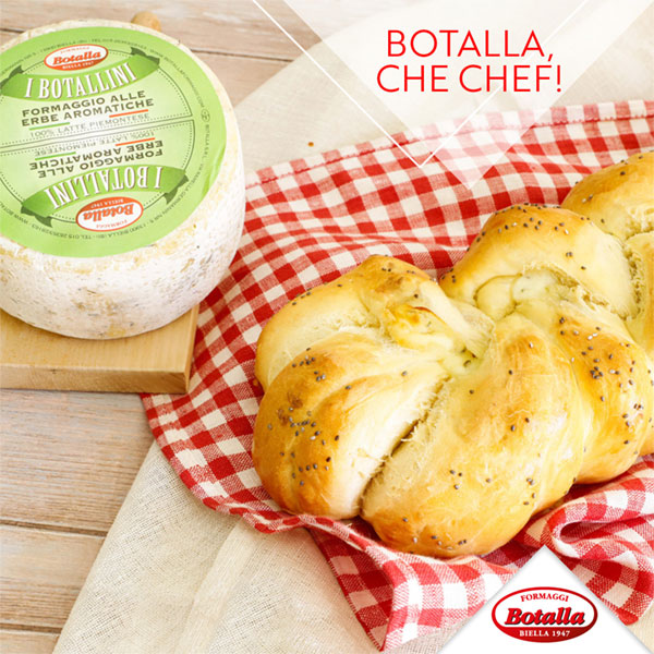 Treccia di pan brioche salata farcita con Formaggio alle Erbe Aromatiche, salame e noci